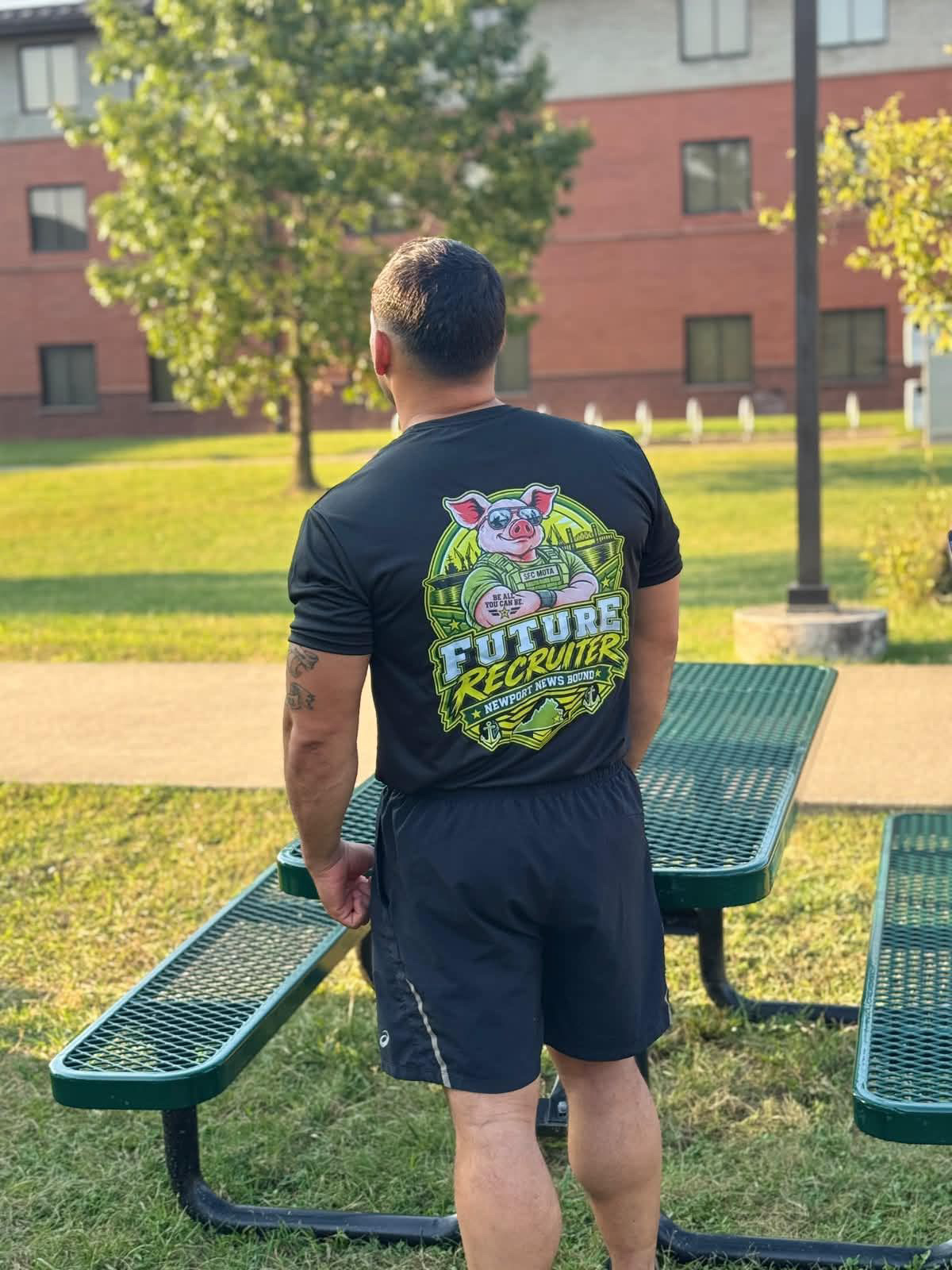 Back of a custom black t-shirt with a full-color Future Recruiter design